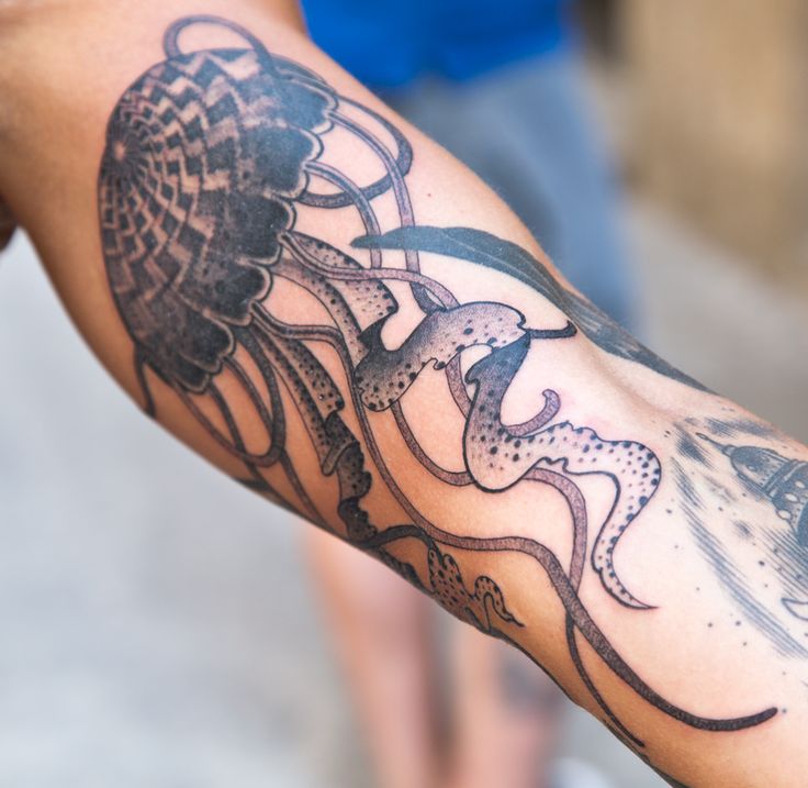 Grey Ink Jellyfish Tattoo On Arm