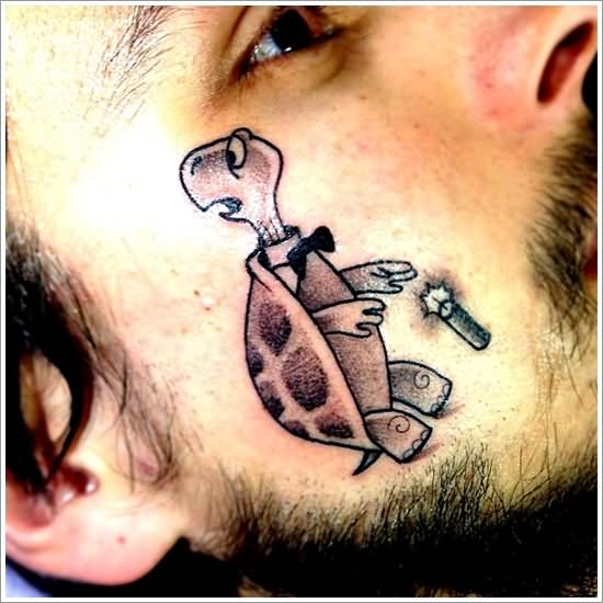 Grey Ink Turtle Tattoo On Face For Men