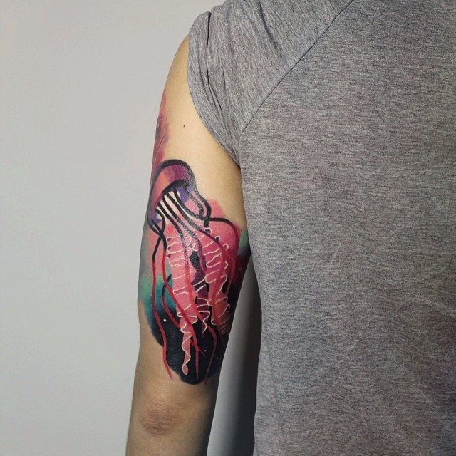 Left Bicep Color Jellyfish Tattoo