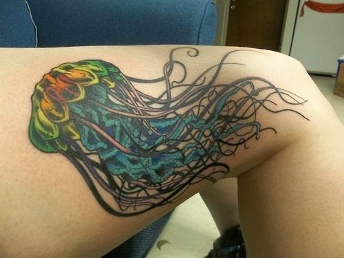 Nice Colored Jellyfish Tattoo On Right Thigh