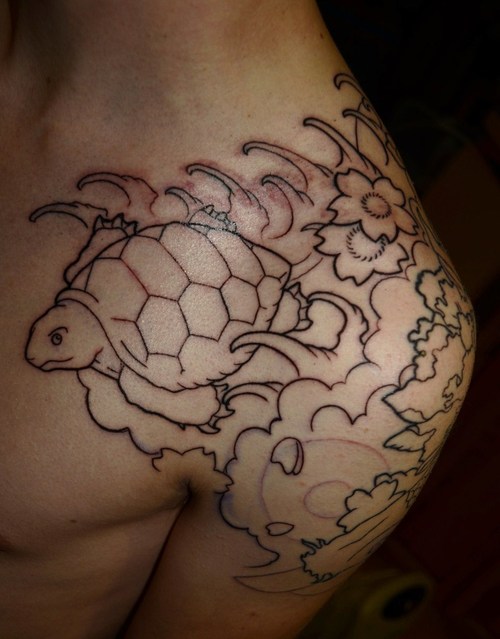 Outline Turtle Tattoo On Man Left Shoulder