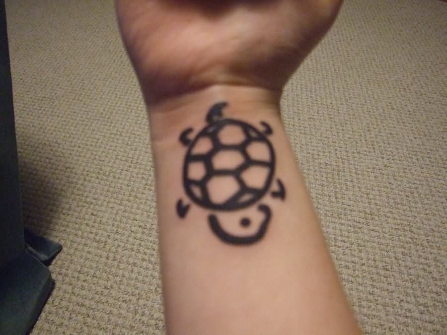 Outline Turtle Tattoo On Right Wrist