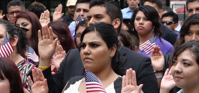 People Taking Part In Oath Ceremony During Citizenship Day