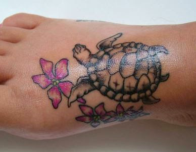 Pink Flowers And Turtle Tattoo On Right Foot