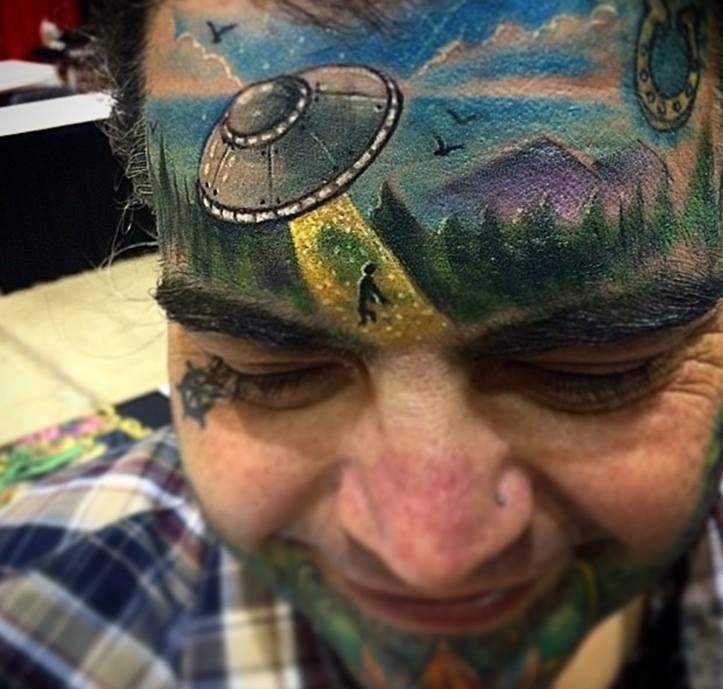 Spaceship Tattoo On Forehead by Johnny Smith