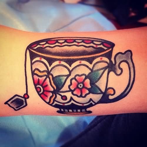 Traditional Flowers And Teacup Tattoo