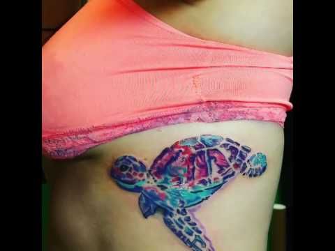 Watercolor Turtle Tattoo On Girl Side Rib