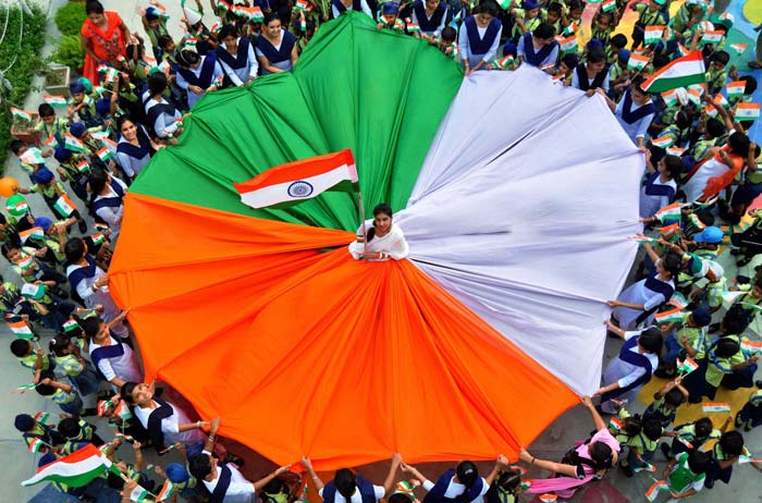 A Girl Wearing Dress As Indian Flag During The Independence Day Celebration