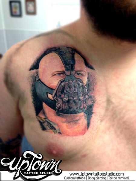 Amazing Bane Face Tattoo On Man Right Chest By UptownTattooStudio