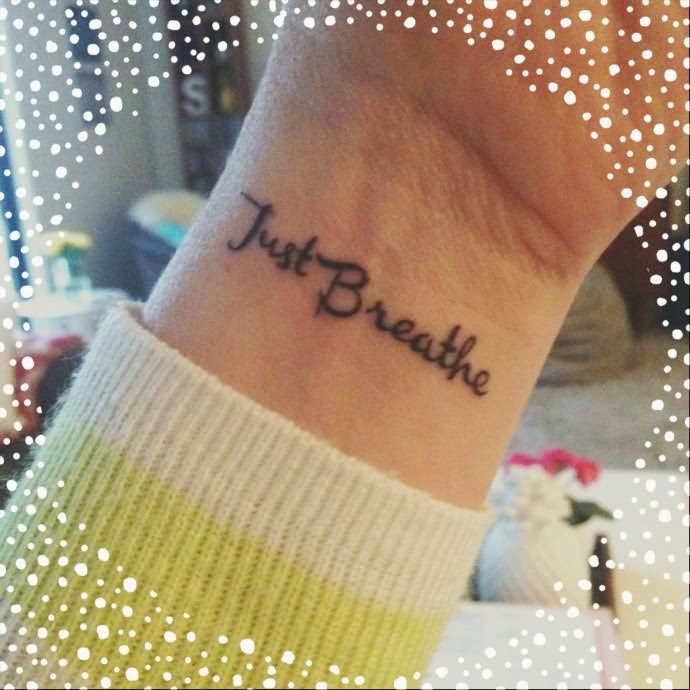 Attractive Just Breathe Lettering Tattoo On Wrist