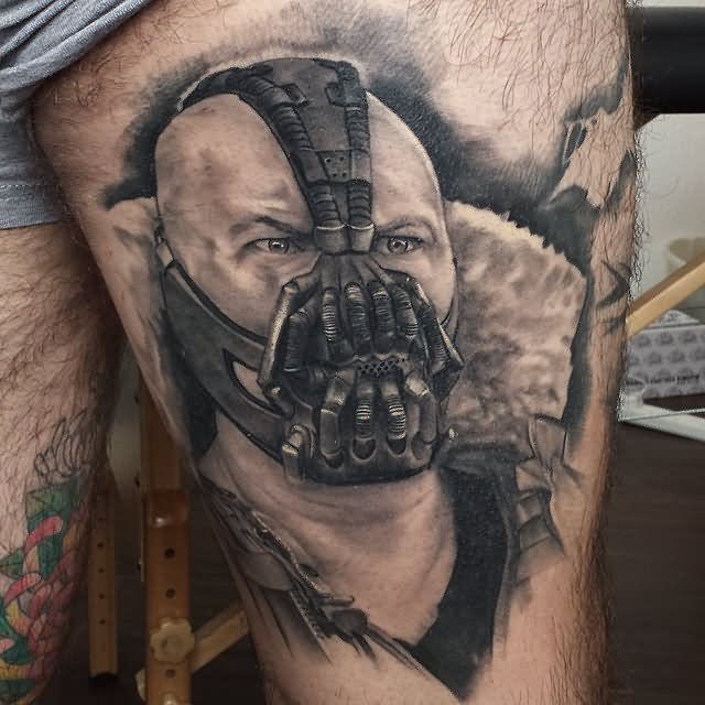 Black And Grey 3D Bane Face Tattoo Design For Thigh