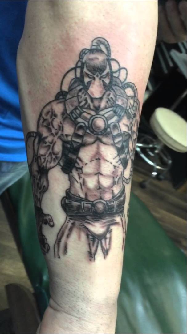Black And Grey Bane Tattoo On Arm