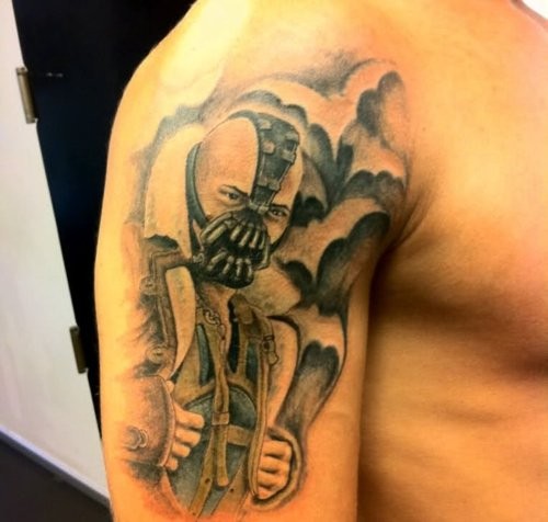 Black And Grey Bane Tattoo On Right Shoulder