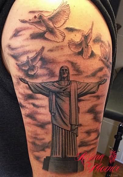 Black And Grey Christ The Redeemer With Flying Doves Tattoo On Right Shoulder