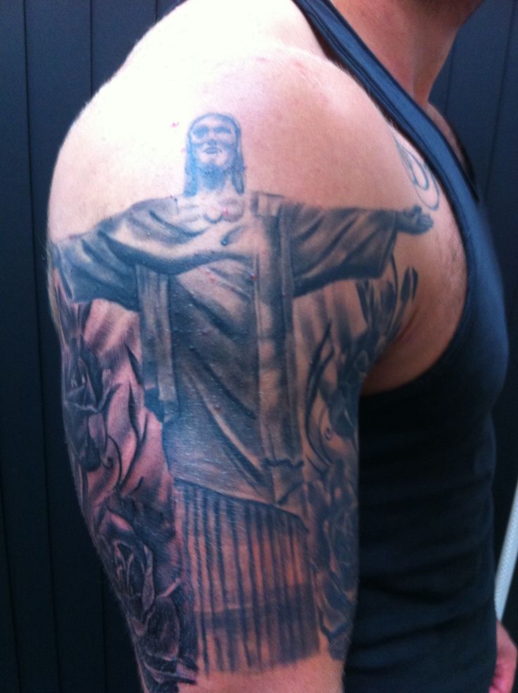 Black Ink Christ The Redeemer Tattoo On Man Right Shoulder