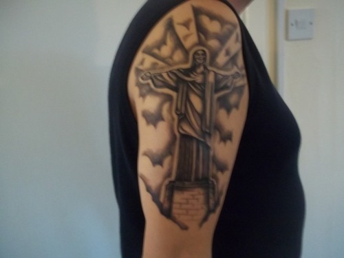 Black Ink Christ The Redeemer Tattoo On Right Half Sleeve