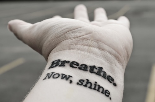 Breathe Now Shine Lettering Tattoo On Left Wrist