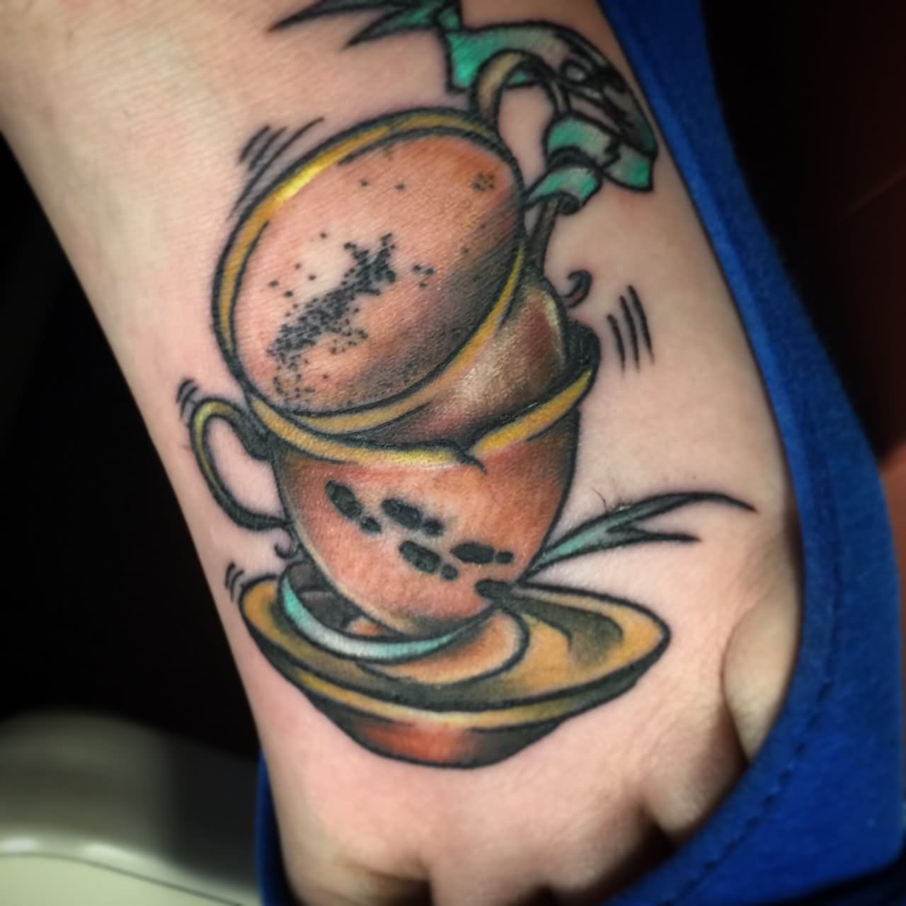 Brown Ink Stacked Teacup Tattoo On Left Foot