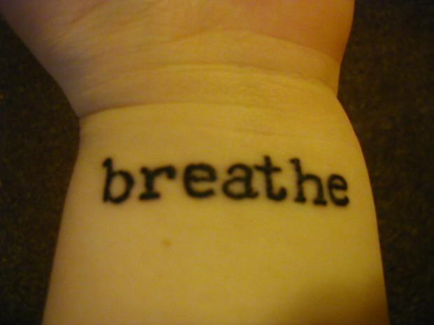 Classic Breathe Lettering Tattoo Design For Wrist