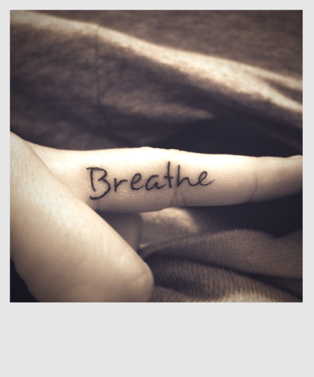 Classic Breathe Lettering Tattoo On Finger