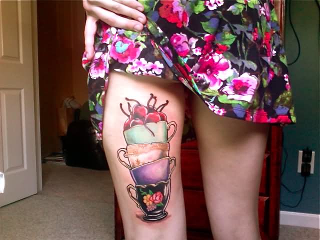 Colored Stacked Teacup Tattoos On Girl Back Leg