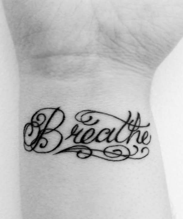Cool Breathe Lettering Tattoo On Wrist
