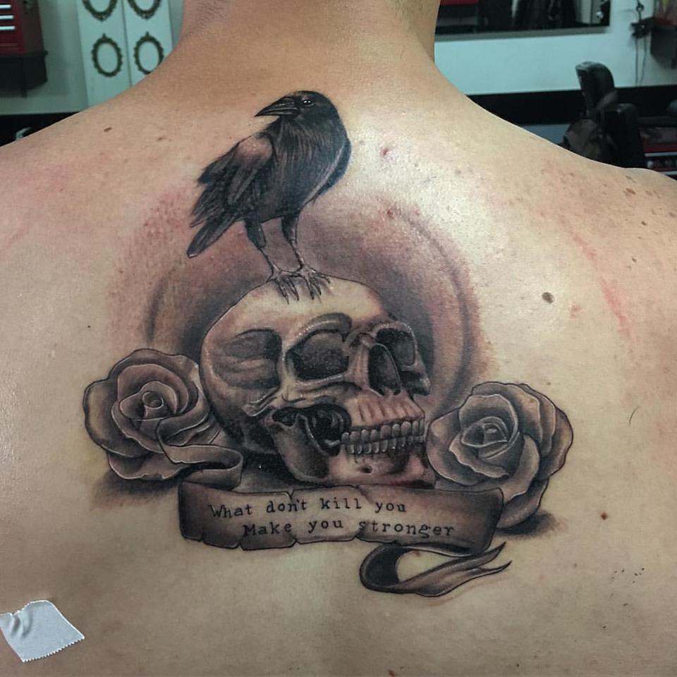 Crow On Skull Tattoo On Upper Back