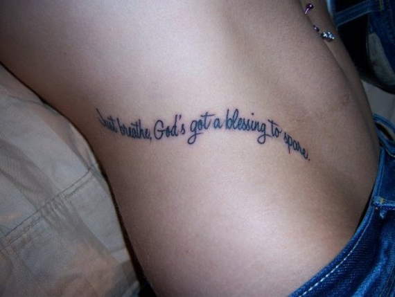 Just Breathe, God's Got A Blessing To Spare Lettering Tattoo On Girl Right Side Rib