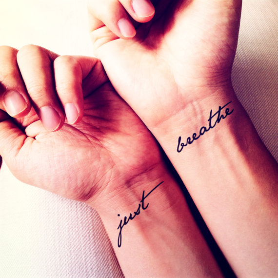 Just Breathe Lettering Tattoo On Both Wrist