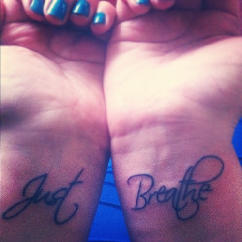 Just Breathe Lettering Tattoo On Girl Both Wrist