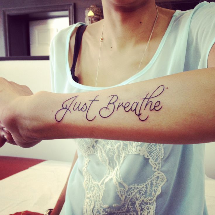Just Breathe Lettering Tattoo On Girl Left Arm