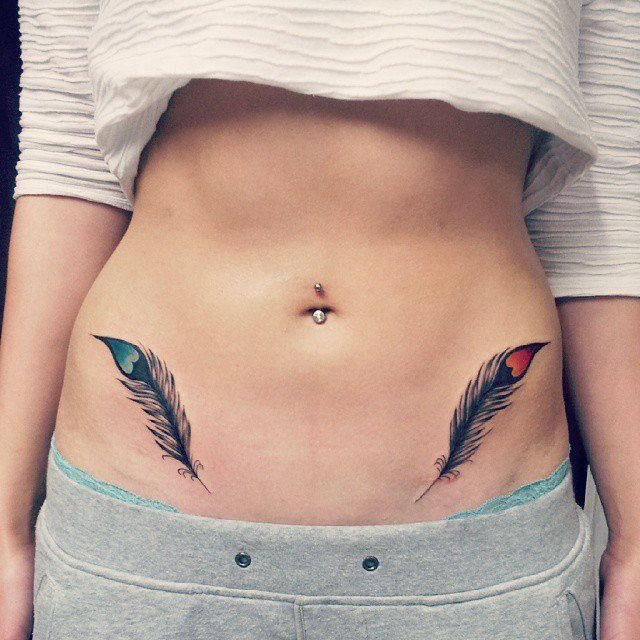Peacock Feather Tattoos On Both Hips