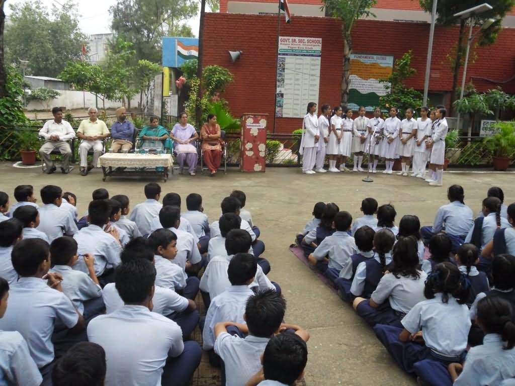 School Children Performing Group Song During Teachers Day Celebration