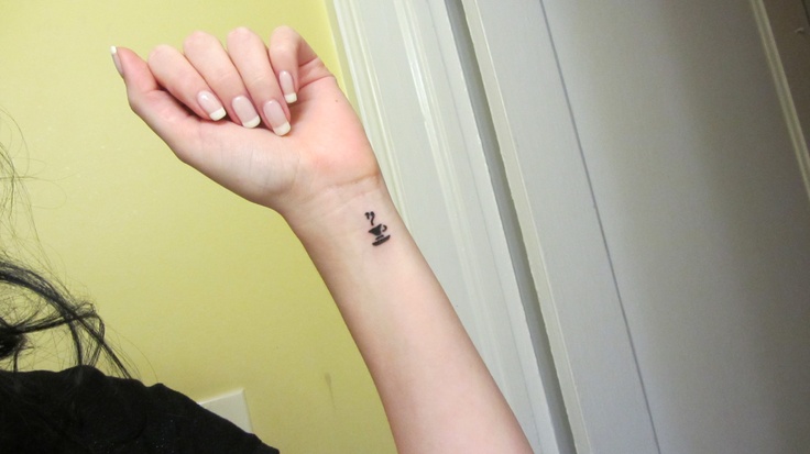Small Black Simple Teacup Tattoo On Wrist