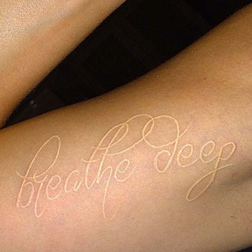 White Ink Breathe Deep Lettering Tattoo Design For Half Sleeve