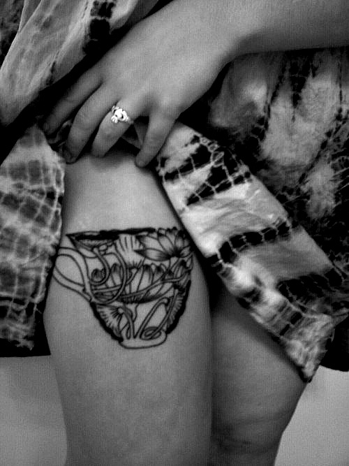 Amazing Black And White Teacup Tattoo On Thigh