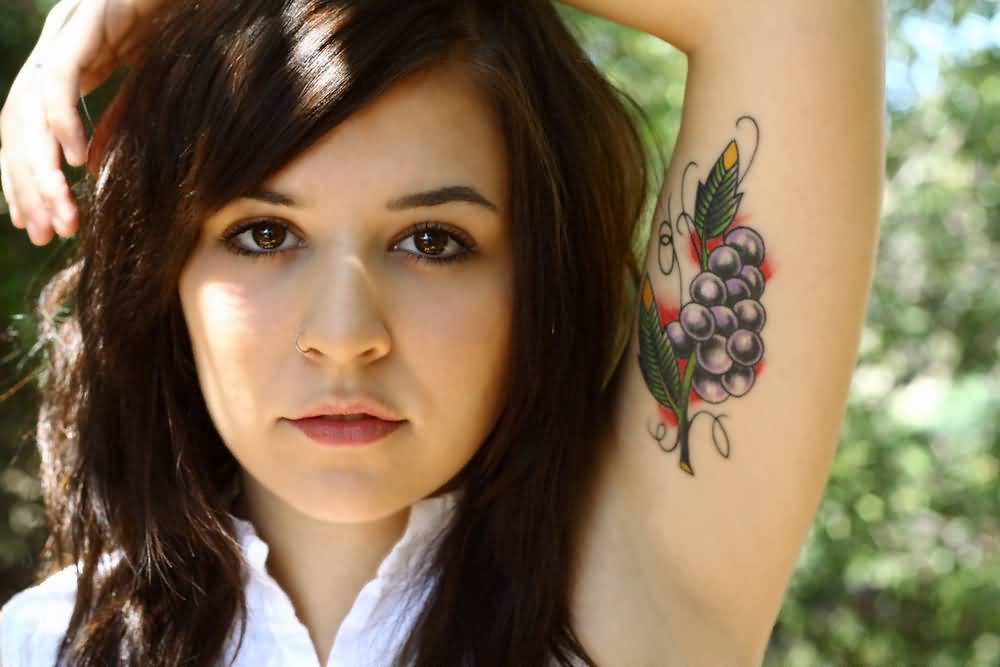 Awesome Grapes Tattoo On Girl Left Bicep