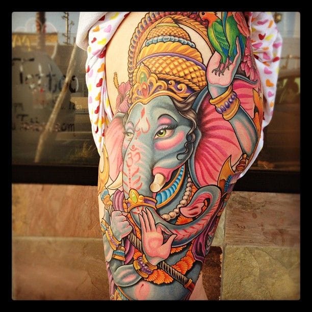 Beautiful Colored Ganesha Tattoo On Side Leg