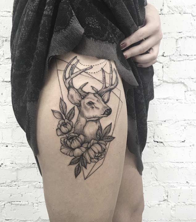 Black And Grey Deer Head With Flowers Tattoo On Girl Right Hip