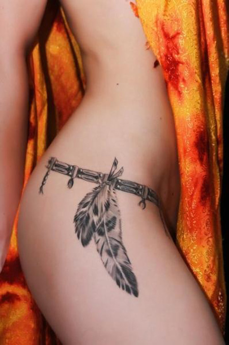 Black And Grey Feathers Tattoo On Girl Right Hip