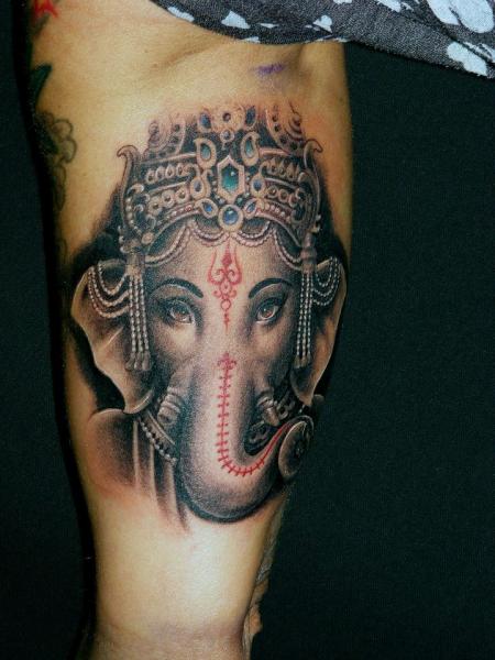 Black And Grey Ganesha Head Tattoo On Bicep