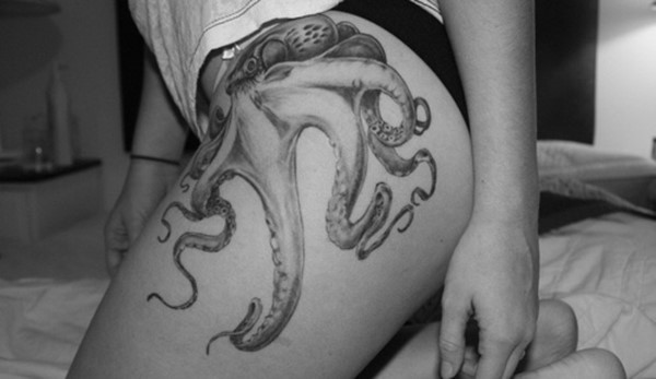 Black And Grey Octopus Tattoo On Girl Left Hip