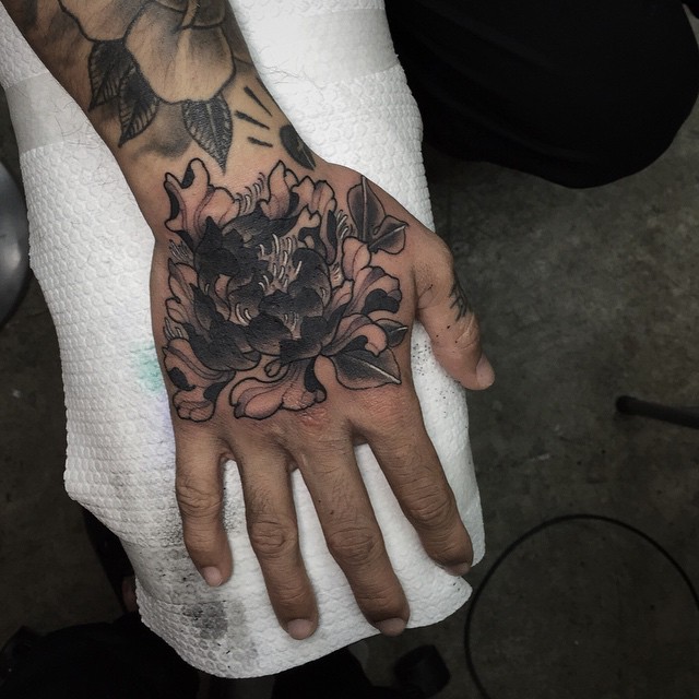 Black And Grey Peony Flower Tattoo On Right Hand
