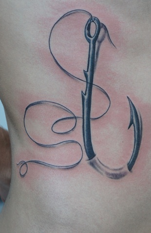 Black And Grey Ripped Skin Hook Tattoo Design For Side Rib