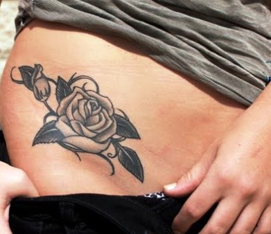 Black And Grey Rose Tattoo On Right Hip