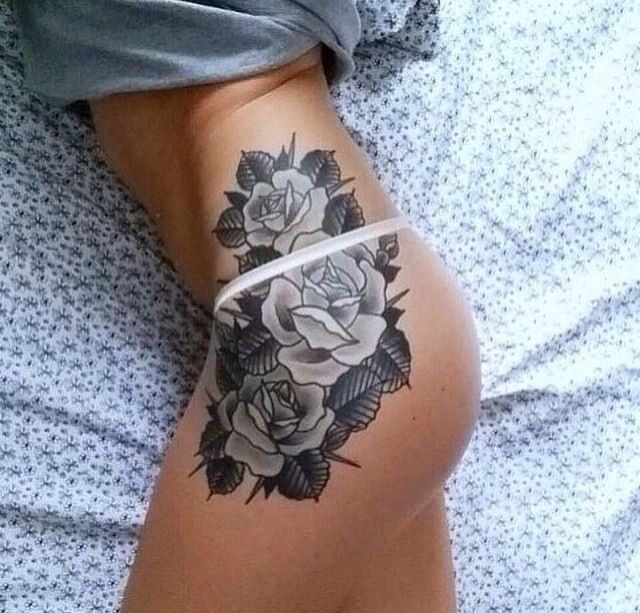 Black And Grey Roses Tattoo On Girl Left Hip