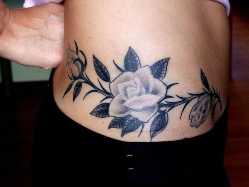 Black And Grey Roses Tattoo On Girl Right Hip