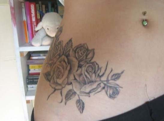 Black And Grey Roses Tattoo On Right Hip
