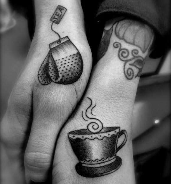 Black And White Tea Bag And Teacup Tattoo On Hands