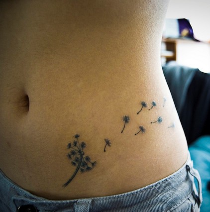 Black Ink Dandelion Tattoo On Left Hip